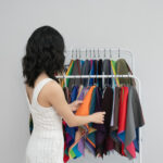 Woman looking at colour sheets